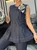 Urban Zipper Denim Sleeveless Top With Brooch