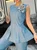 Urban Zipper Denim Sleeveless Top With Brooch